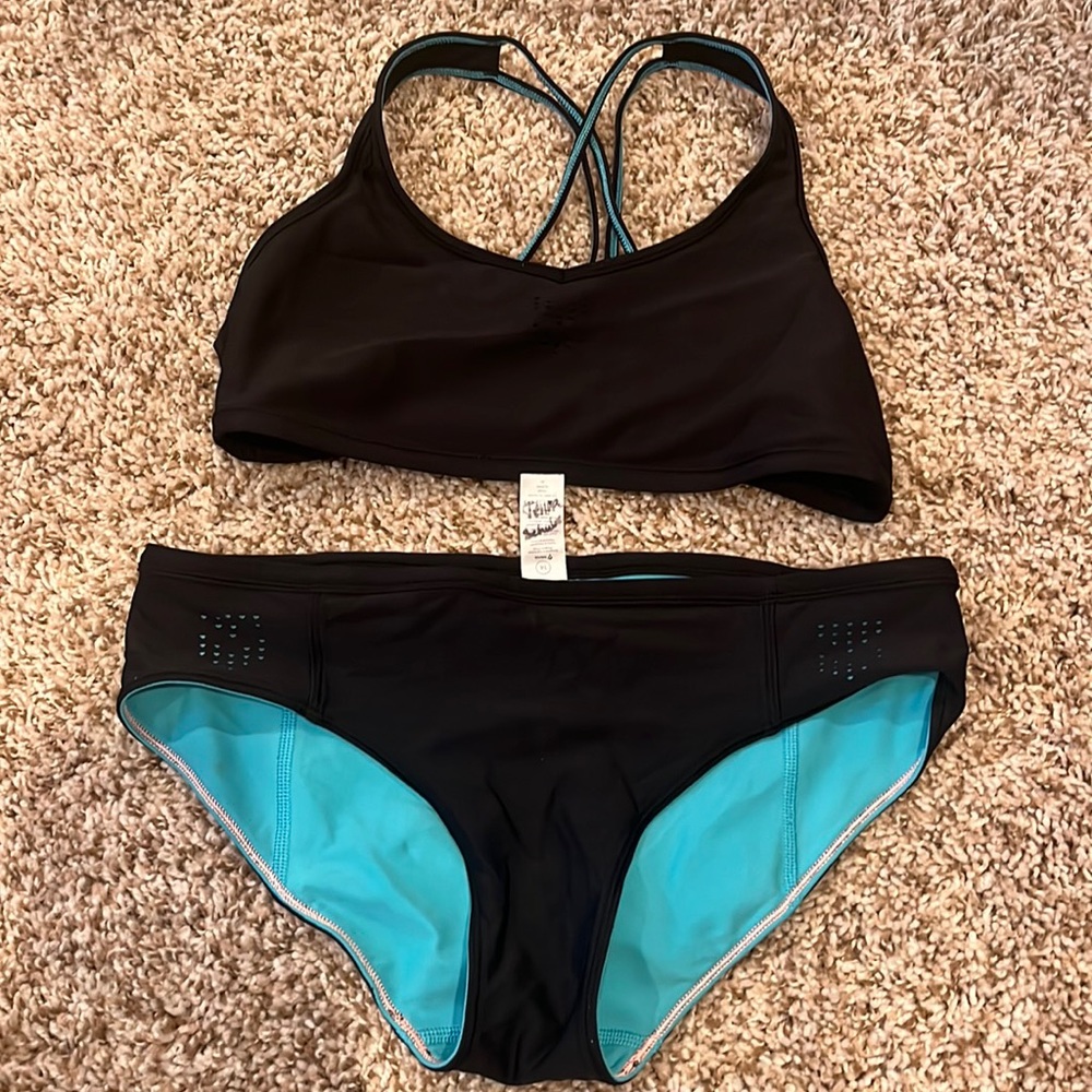 Girls ivivva brand reversible bathing duit. Size14